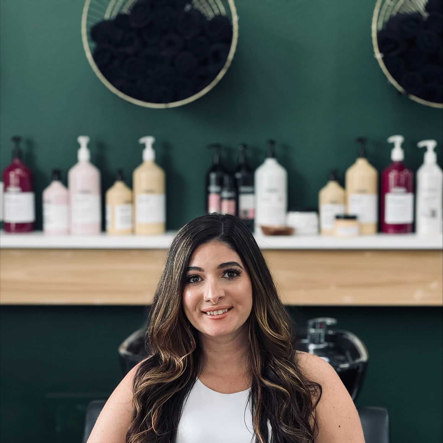 Portrait of Victoria Santacroce, a professional stylist at Soffio Salon Studio, showcasing their expertise and style.