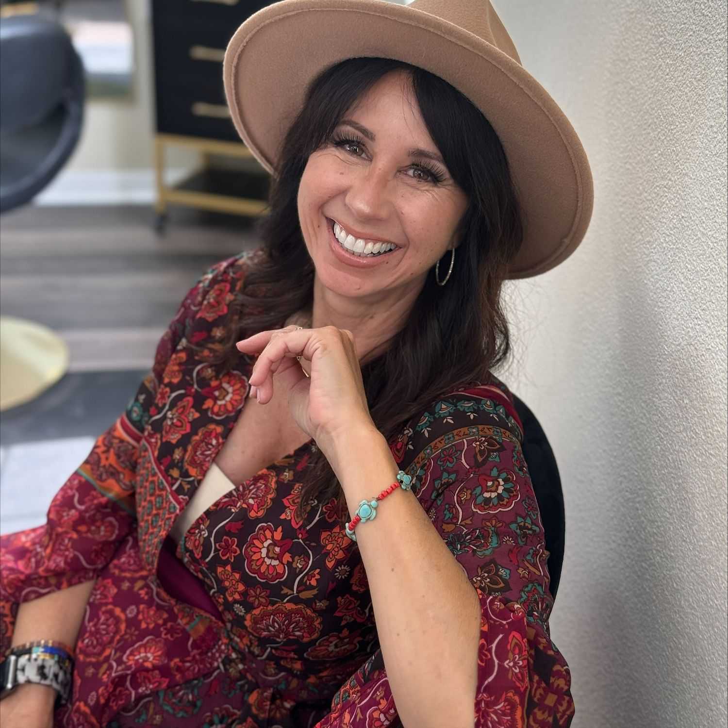 Portrait of Monique Sulinski, a professional stylist at Soffio Salon Studio, showcasing their expertise and style.